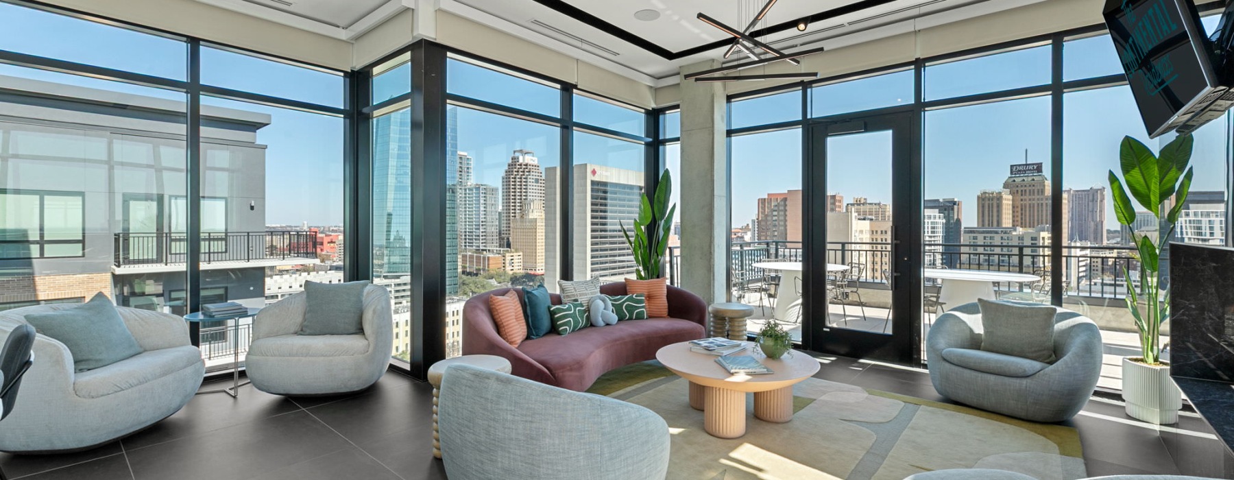 couches in a room with a table 