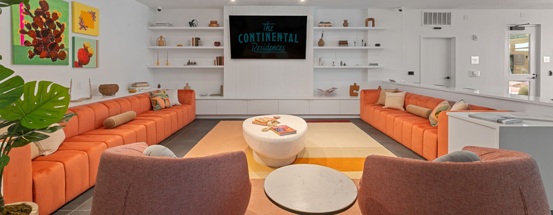 couches surrounding a table 