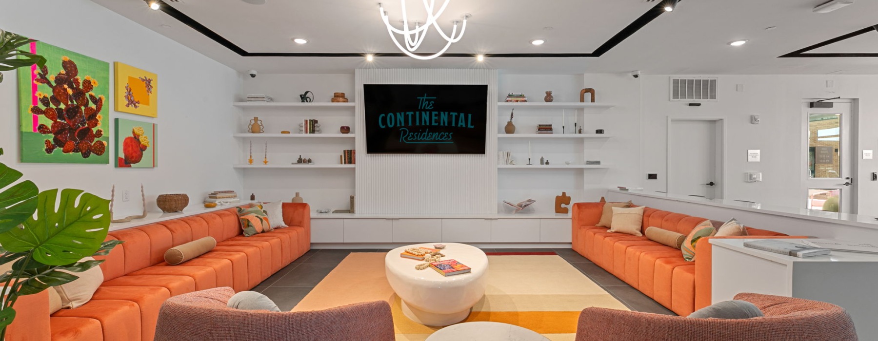 chairs with table and tv