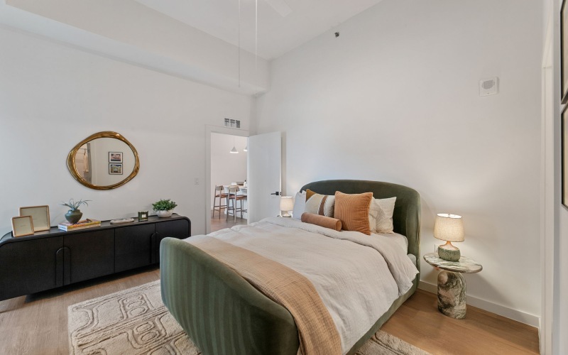 Room with a bed and dresser