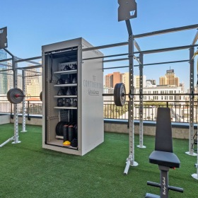 Outdoor Fitness Area with Free Weights and Functional Training.