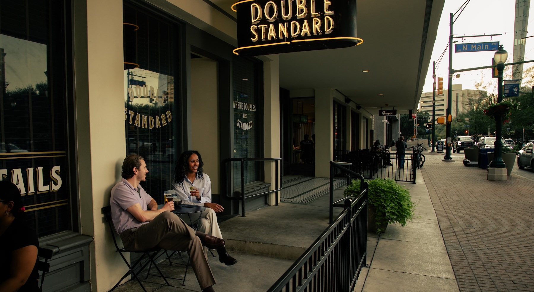 couple sitting outside restaurant